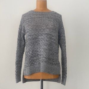 Great year round weight. White with black yarn appears heather gray overall.